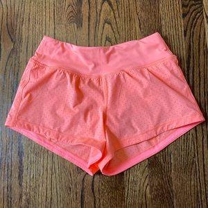 lululemon athletica final lap shorts coral sz 4